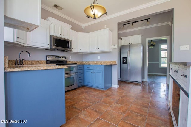 1453 Whitetail Dr, Hernando, MS 38632 - kitchen with appliances with stainless steel finishes, white cabinets, ornamental molding, decorative light fixtures, and blue cabinets