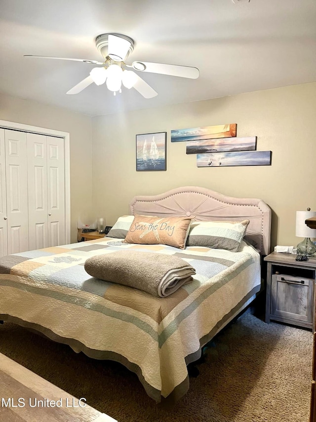 bedroom with carpet floors, a ceiling fan, and a closet