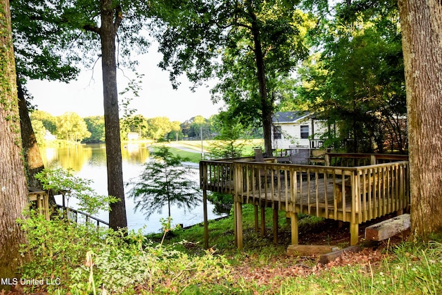 10991 High Rd, Hernando, MS 38632 - dock featuring a deck with water view and view of wooded area