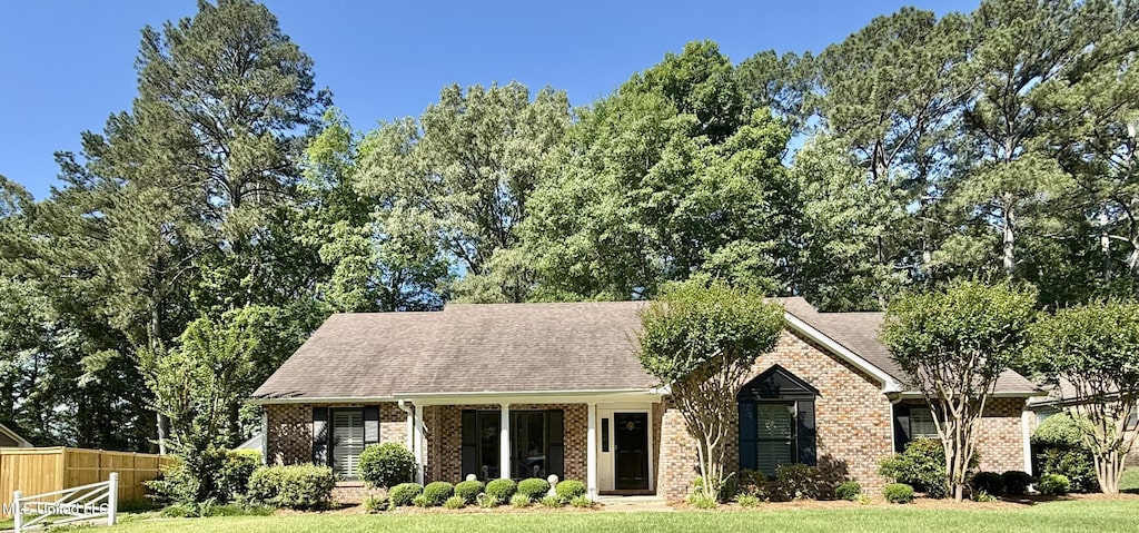 697 Country Place Dr, Pearl, MS 39208 - view of front of home with brick siding and a shingled roof