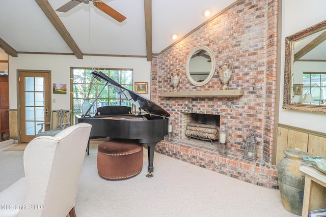 697 Country Place Dr, Pearl, MS 39208 - carpeted living room featuring ceiling fan, a wainscoted wall, and a brick fireplace