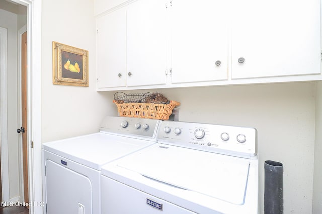 697 Country Place Dr, Pearl, MS 39208 - laundry area with cabinet space and separate washer and dryer
