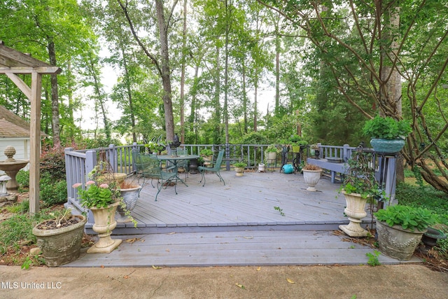 697 Country Place Dr, Pearl, MS 39208 - wooden terrace featuring outdoor dining space
