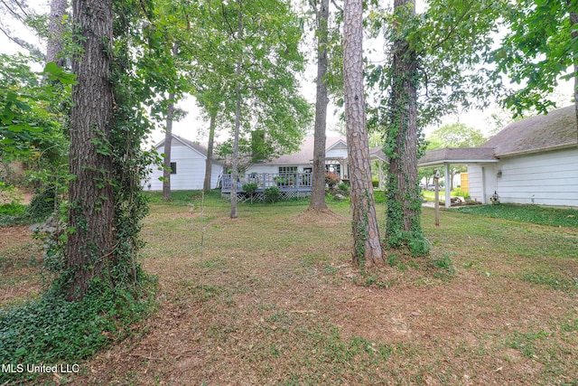 697 Country Place Dr, Pearl, MS 39208 - view of green lawn with a wooden deck