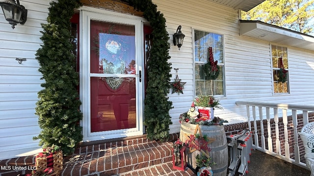 20507 Old Biloxi Rd, Vancleave, MS 39565 - doorway to property featuring a porch