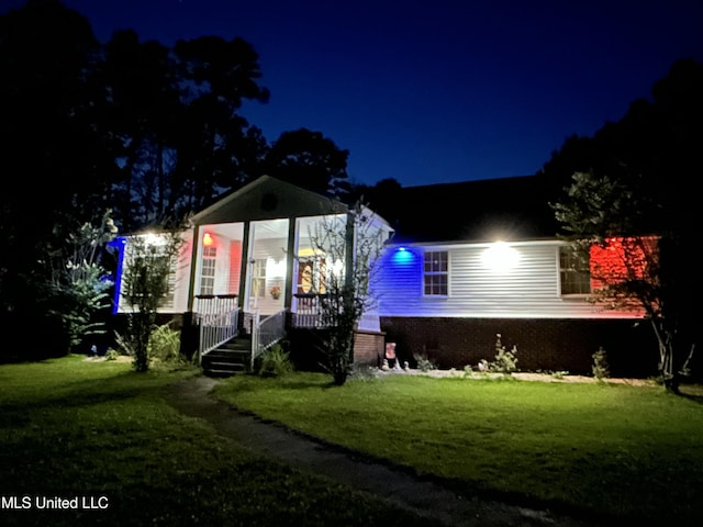 20507 Old Biloxi Rd, Vancleave, MS 39565 - view of front of property featuring a yard, covered porch, and brick siding