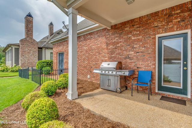 view of patio with a grill