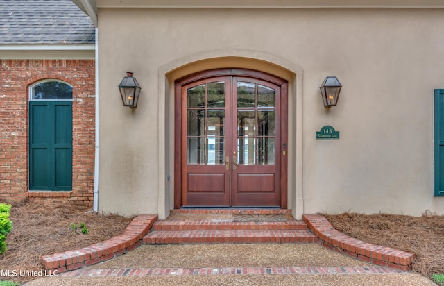 doorway to property with french doors