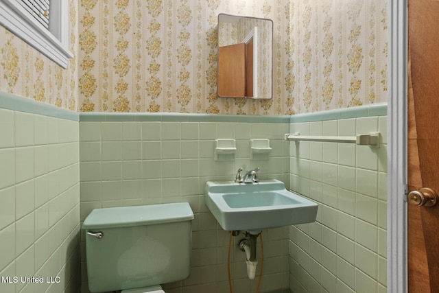 bathroom with sink and toilet