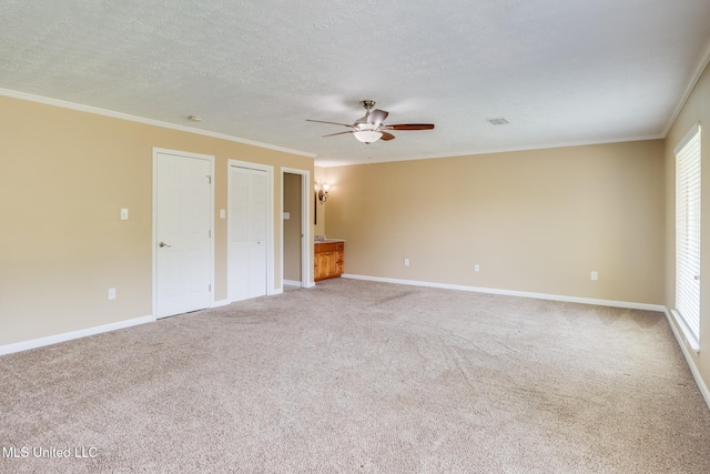 12 Bayou View Dr, Gulfport, MS 39507 - carpeted empty room featuring ceiling fan, ornamental molding, and a textured ceiling