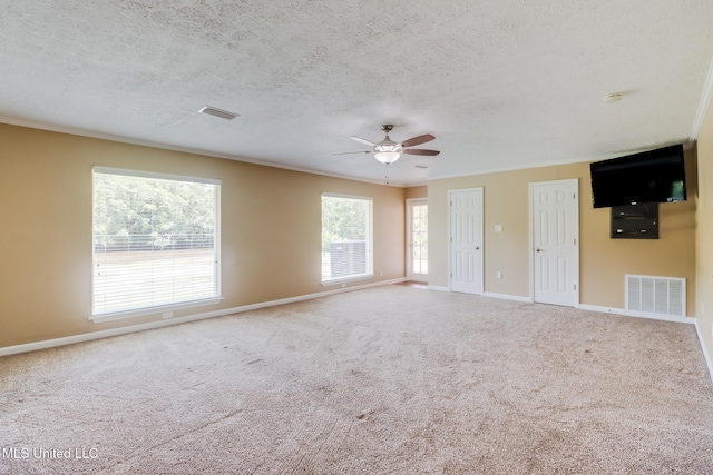 12 Bayou View Dr, Gulfport, MS 39507 - carpeted spare room with ceiling fan, a textured ceiling, and a smoke detector