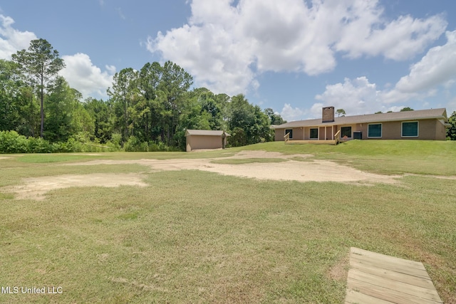 12 Bayou View Dr, Gulfport, MS 39507 - view of grassy yard with a storage shed