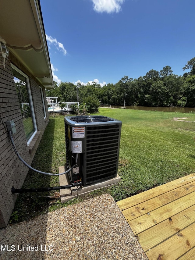 12 Bayou View Dr, Gulfport, MS 39507 - exterior view of a cooling unit and brick siding