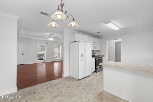 kitchen featuring white appliances, white cabinetry, light countertops, and crown molding