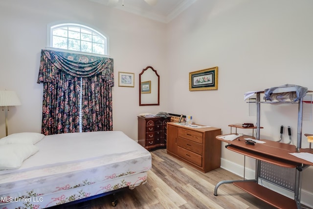 41 C G Evans Rd, Wiggins, MS 39577 - bedroom with ornamental molding and light wood-type flooring