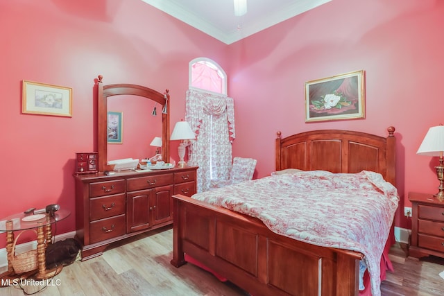 41 C G Evans Rd, Wiggins, MS 39577 - bedroom featuring baseboards, ornamental molding, and light wood-style floors