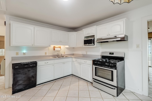 kitchen with light tile patterned floors, stainless steel appliances, sink, and white cabinets