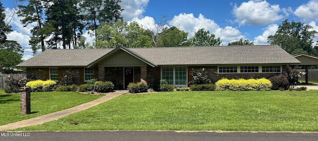 ranch-style home with a front yard