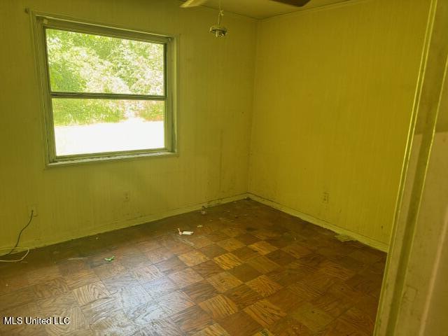 205 Hillside Dr, Vicksburg, MS 39180 - spare room featuring dark floors