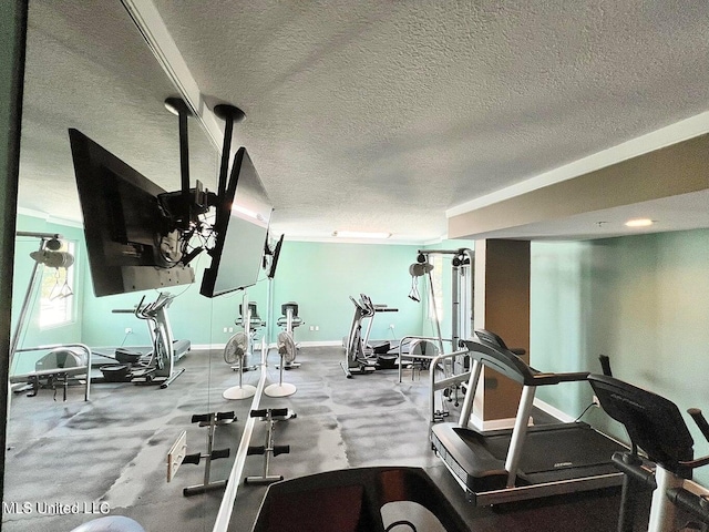 gym with a textured ceiling