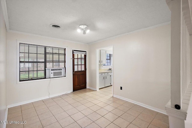 244 Massey Cir, Carthage, MS 39051 - unfurnished room featuring cooling unit, crown molding, a textured ceiling, baseboards, and light tile patterned flooring