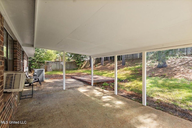 244 Massey Cir, Carthage, MS 39051 - fenced backyard featuring central air condition unit and a patio