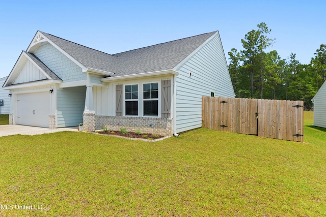 14172 Debra Barbee Ct, Gulfport, MS 39503 - craftsman-style home with a shingled roof, a garage, board and batten siding, driveway, and brick siding