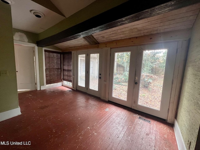 doorway to outside with hardwood / wood-style floors, lofted ceiling with beams, and french doors