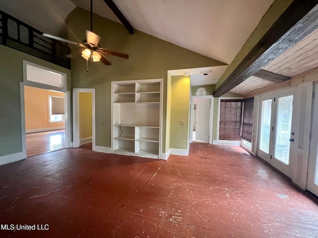 unfurnished living room featuring ceiling fan, high vaulted ceiling, and beamed ceiling