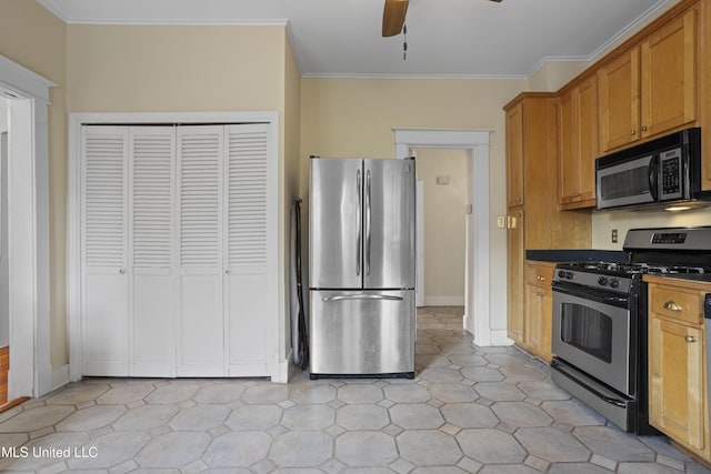 kitchen featuring ornamental molding, ceiling fan, appliances with stainless steel finishes, and brown cabinetry