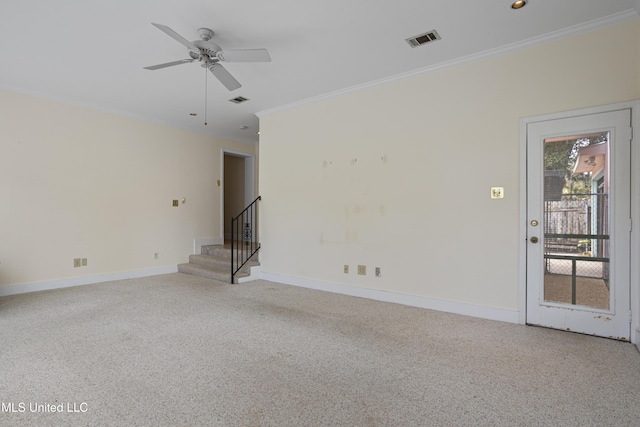 unfurnished living room with visible vents, ornamental molding, carpet flooring, baseboards, and stairs