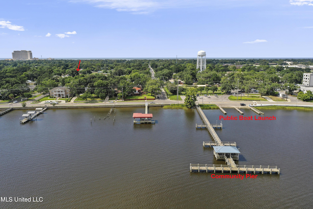 birds eye view of property featuring a water view