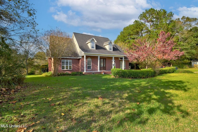 new england style home with a front yard