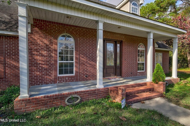 doorway to property featuring a porch