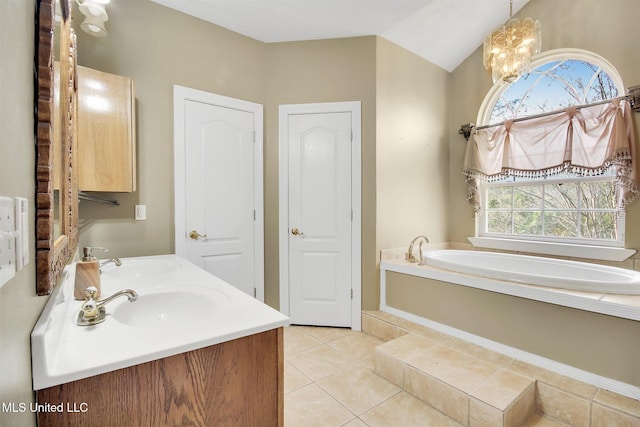 bathroom with tile patterned floors, plenty of natural light, lofted ceiling, and tiled bath