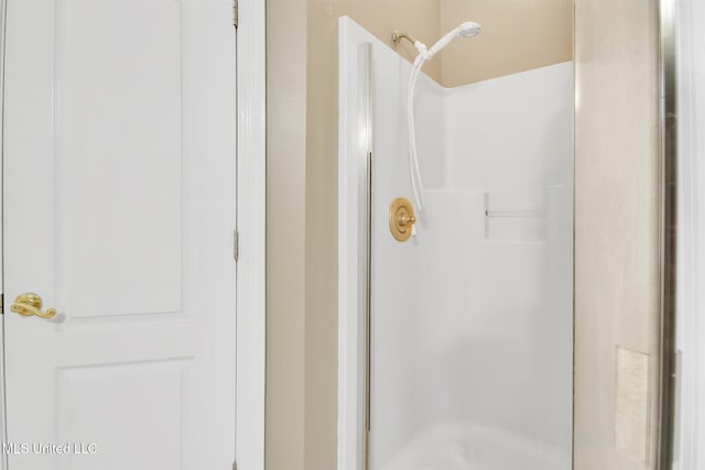 bathroom with walk in shower