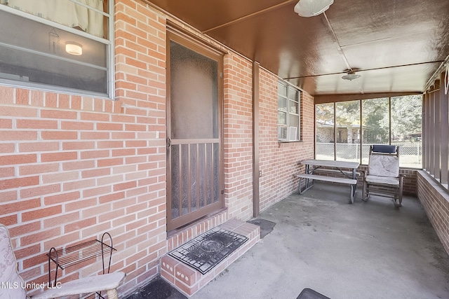 unfurnished sunroom with vaulted ceiling