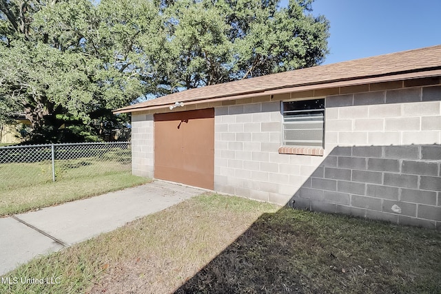 exterior space with a storage shed