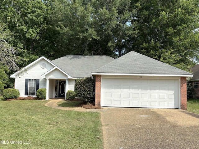 106 Ole Duke Dr, Brandon, MS 39042 - ranch-style house with driveway, brick siding, and a front lawn