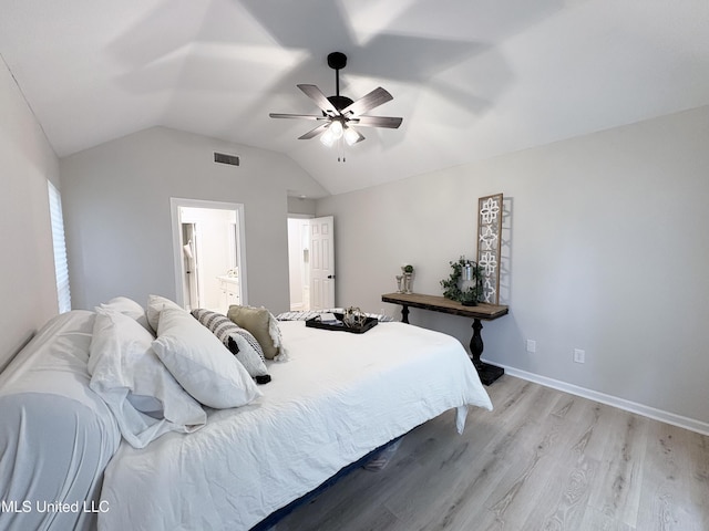 106 Ole Duke Dr, Brandon, MS 39042 - bedroom with light wood-style floors, vaulted ceiling, ceiling fan, ensuite bathroom, and baseboards