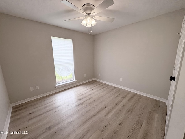 106 Ole Duke Dr, Brandon, MS 39042 - empty room with light wood-style flooring, a ceiling fan, and baseboards