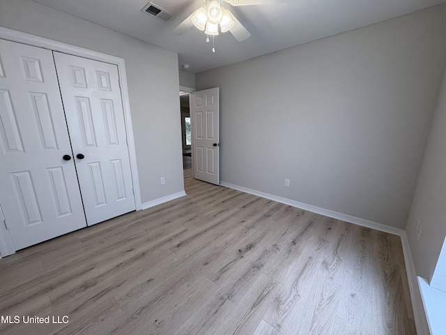 106 Ole Duke Dr, Brandon, MS 39042 - unfurnished bedroom featuring light wood-style floors, baseboards, a closet, and ceiling fan