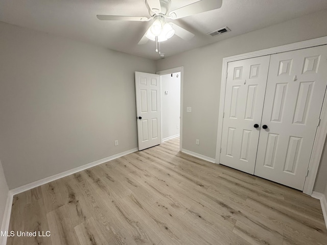 106 Ole Duke Dr, Brandon, MS 39042 - unfurnished bedroom with light wood finished floors, baseboards, a closet, and ceiling fan