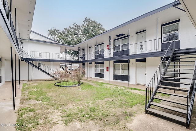 view of yard featuring stairs