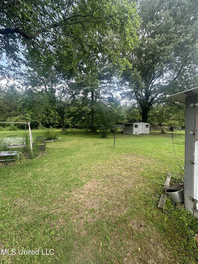 176 Revell Rd, Grenada, MS 38901 - view of grassy yard with view of scattered trees