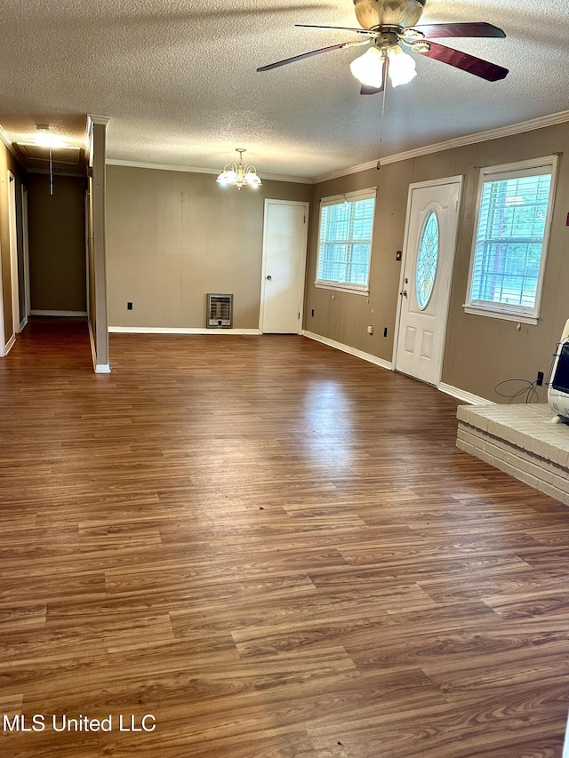 176 Revell Rd, Grenada, MS 38901 - unfurnished living room featuring ornamental molding, wood finished floors, a ceiling fan, a textured ceiling, and baseboards
