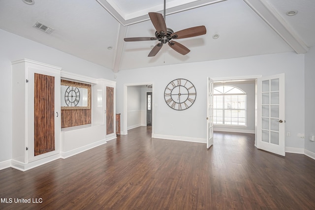 unfurnished living room featuring dark wood-type flooring, visible vents, lofted ceiling with beams, and baseboards