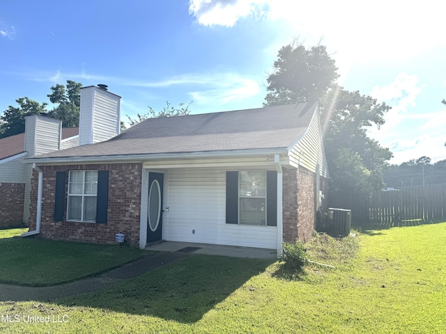 2005 Foxhill Ln, Byram, MS 39272 - view of front of house featuring brick siding, a chimney, and covered porch