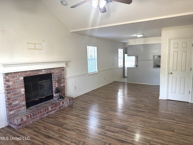 2005 Foxhill Ln, Byram, MS 39272 - unfurnished living room with a ceiling fan, wood finished floors, a fireplace, and lofted ceiling