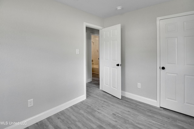 unfurnished bedroom featuring light hardwood / wood-style floors